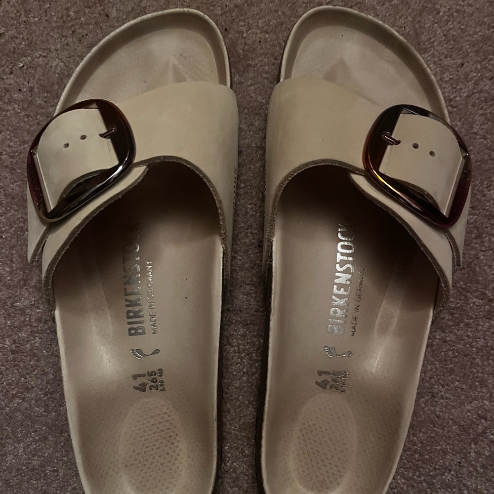 Birkenstock Off-White Sandals with Metallic Buckle